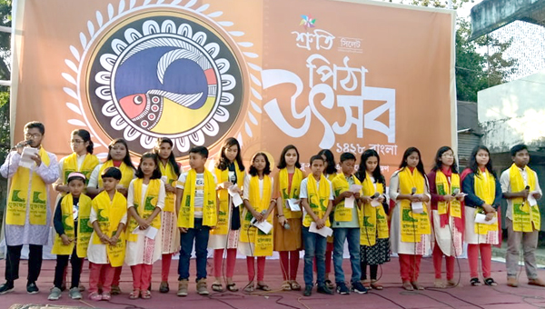 শ্রুতির পিঠা উৎসবে মুক্তাক্ষরের আবৃত্তি