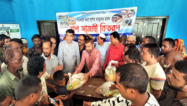 এম.সি এন্ড সরকারি কলেজ এলামনাই এসোসিয়েশন অব ইউএসএ ত্রাণ বিতরণ