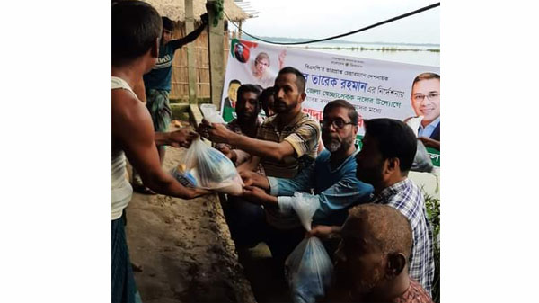 খাদিমপাড়ায় সিলেট জেলা স্বেচ্ছাসেবক দলের খাদ্যসামগ্রী বিতরণ